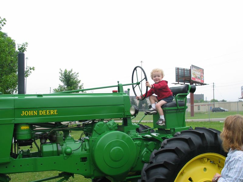Model 70 Hi-Crop
Most of the tractors were strictly "Don't touch", but this particular one actually had a sign that said "Please climb on the tractor"!  William was more than happy to oblige.

