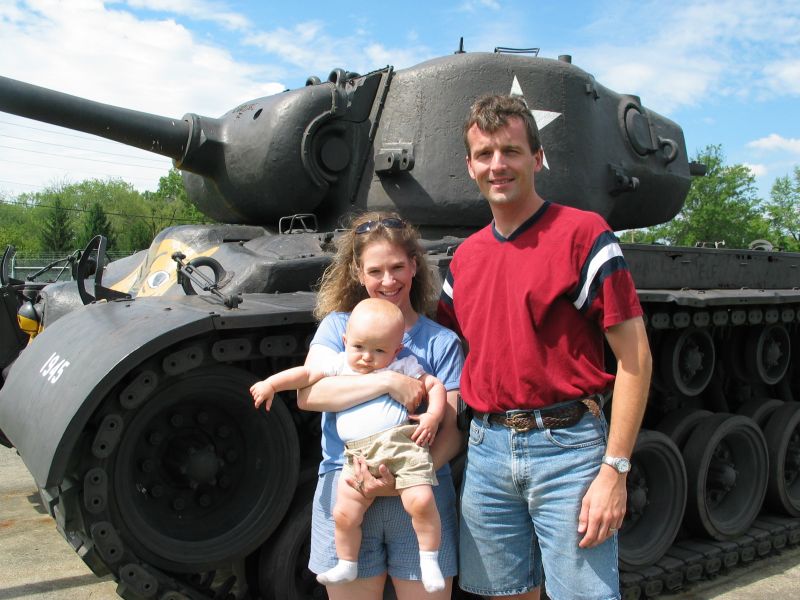 Posing by a tank
Cathy seems to have an odd hold on William here!
