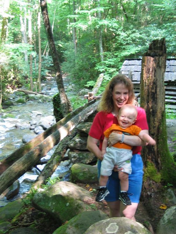 Cathy and William by a Stream
One of the first things we did in the park was drive a loop with some old farmsteads that are now on park property.  Many of the farmsteads had hiking trails, and this particular one had a pretty stream with an old sawmill where we posed for a picture.
