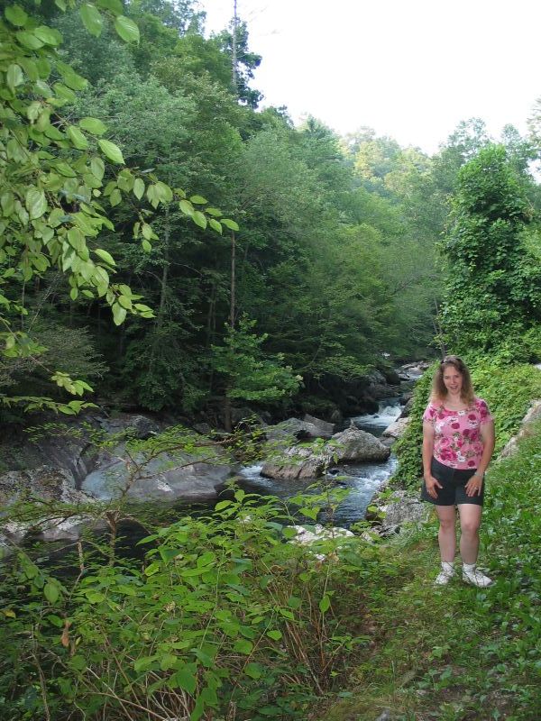 Cathy Poses by a Stream
