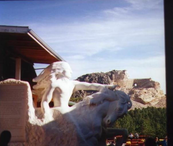 Crazy Horse and Model
Here is a view of the model of what the finished sculpture will look like someday, with the actual mountain carving in the background.
