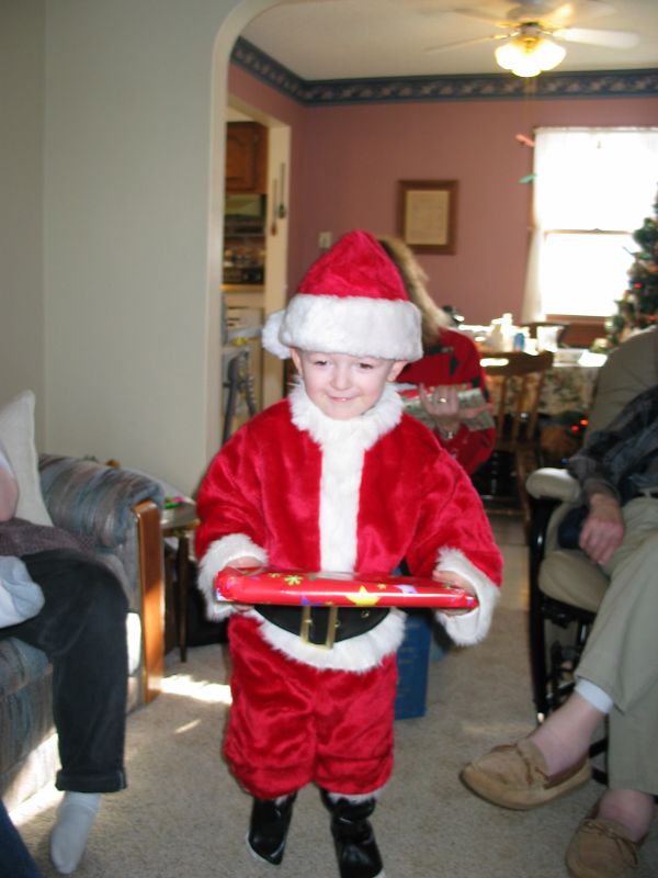 Santa at Grandpa's
William passes out presents at Grandpa's.
