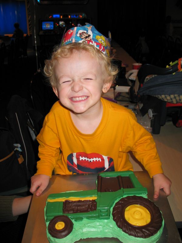 John Deere cake
William got to have not one but TWO John Deere Tractor cakes for his birthday.  This is the first.  The second is coming up in this album, and features a wagon as well!
