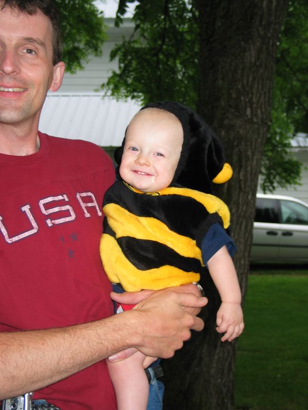 Andrew-Bee
For the Kiddie Parade in Meservey, Andrew dons a bee costume.  Whoever took this picture decided Tim wasn't worth getting fully in the shot <g>.
