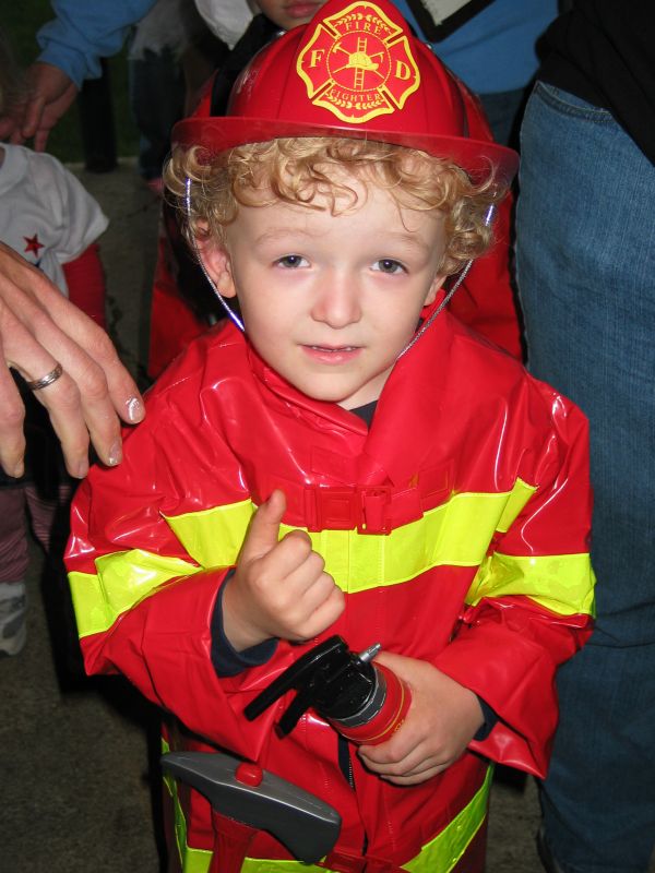 Fireman William
William as a fireman for the Meservey kiddie parade.  Since we live near a fire station, William gets to see the trucks pretty often.  He has several play fire trucks of his own as well.  
