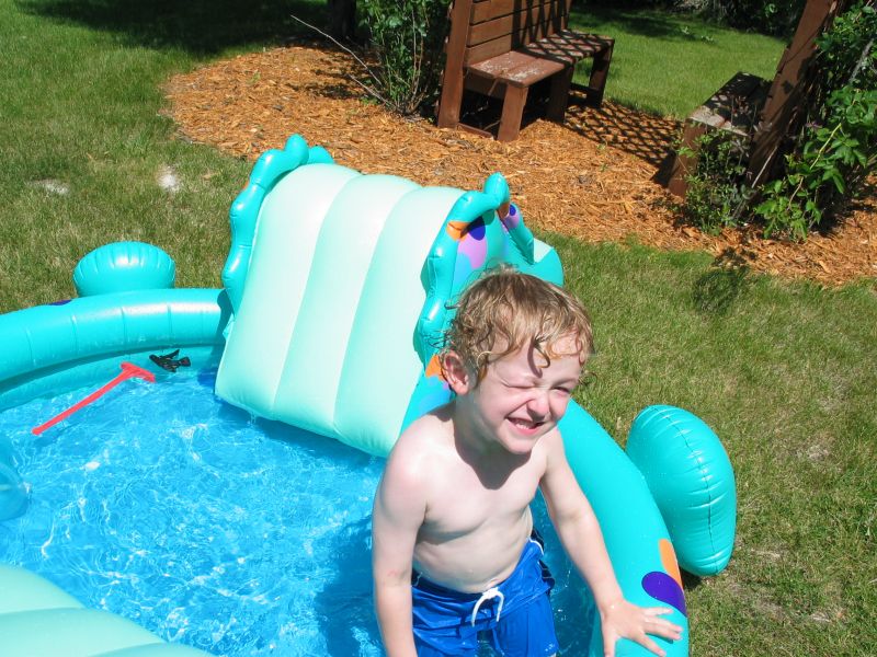 William splashes around in the pool
