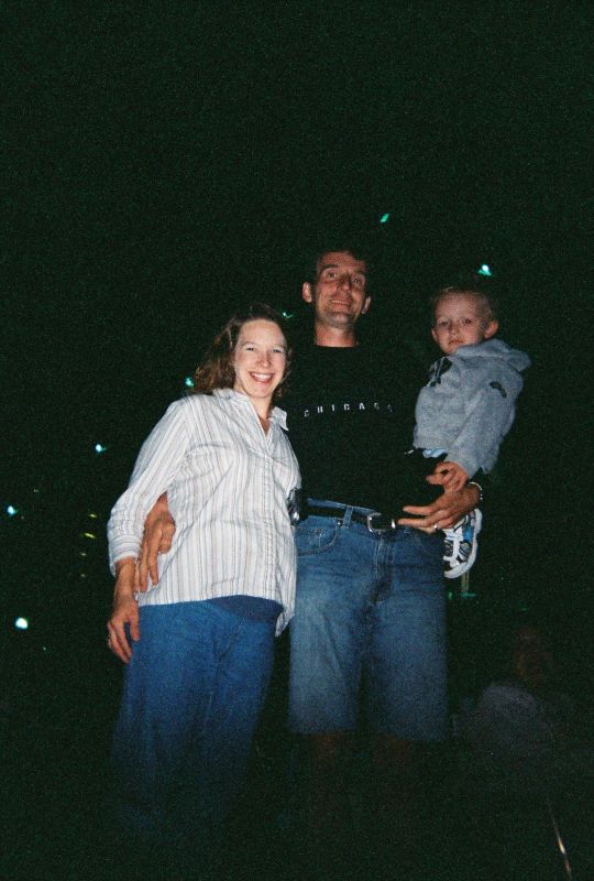 Last pic before the Fischer Family expanded
A stranger took this picture of us with our disposable camera, with the lights of the Hennepin Ave. Bridge in the background.  This would be the last picture taken of our "size-3" family.
