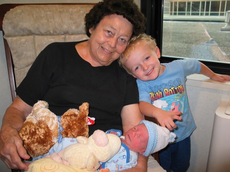 Grandma, William, and Andrew
Grandma and William pose with Andrew, with a couple cameos by some stuffed animals.
