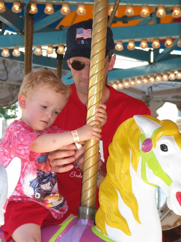 Ride a painted pony
Dad shares a ride with William on the Merry-Go-Round
