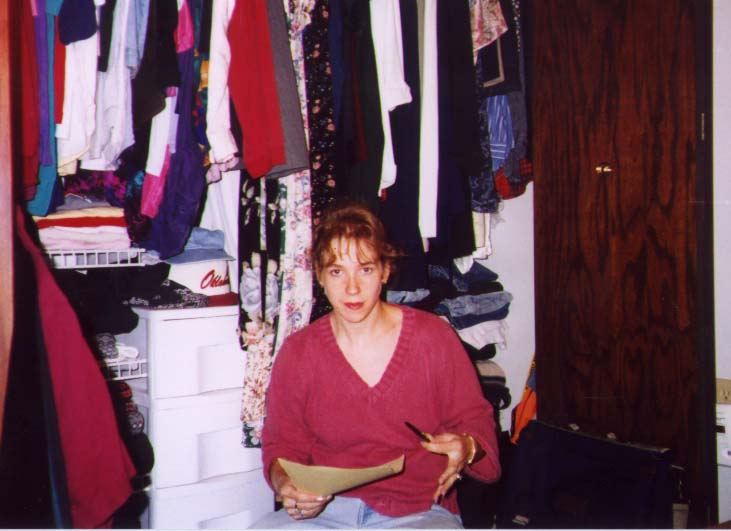 Cathy
Cathy sorts through a closet at our old home.
