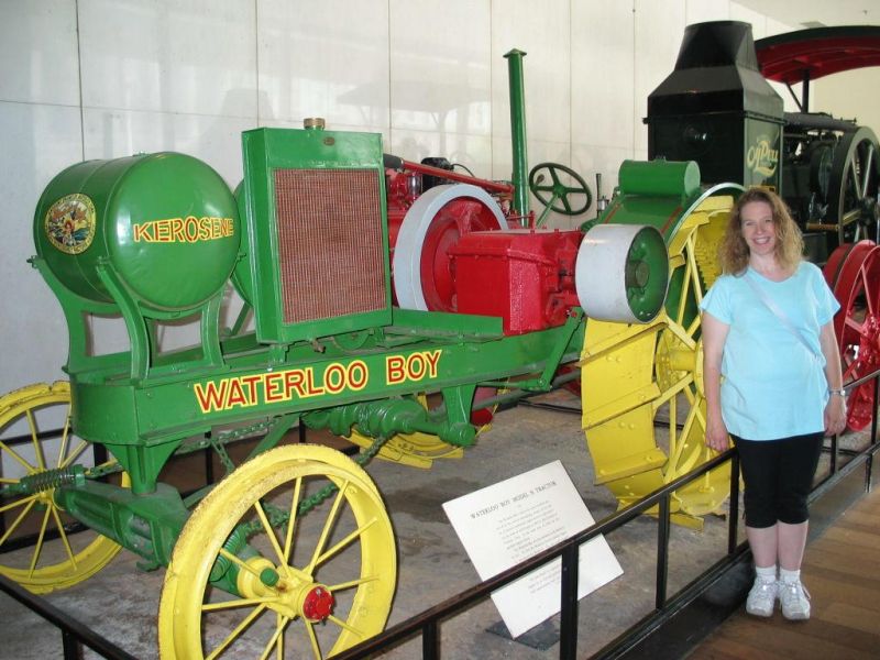 Waterloo Boy
Here Cathy poses with a John Deere Waterloo Boy in the Museum of American History.  If you've browsed elsewhere in this site, you know we're John Deere fans.  You can also find other Deere pictures from previous vacations to Moline and Charles City.
