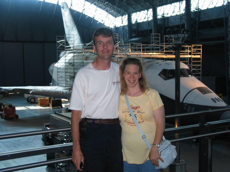 Tiim & Cathy with Enterprise
Here we pose in front of the Enterprise, although the kind gentleman who took the picture for us didn't frame it very well <grin>.

