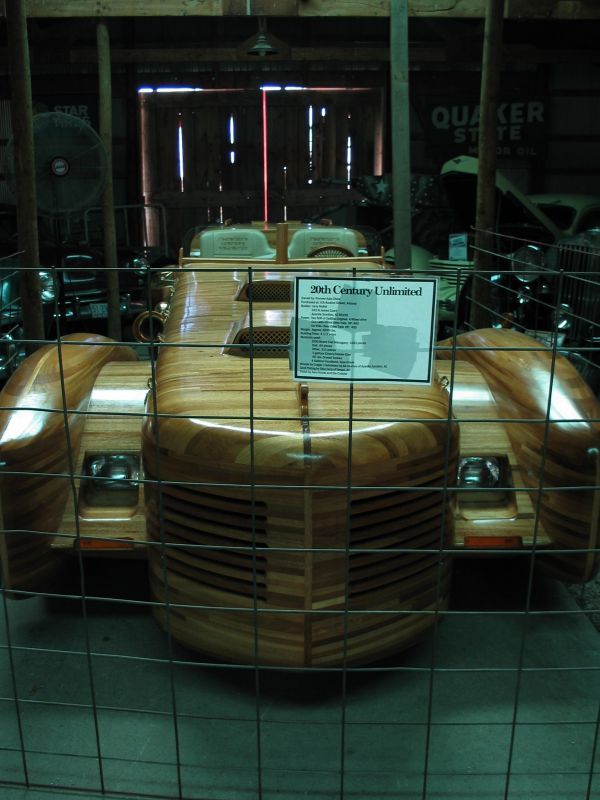 Wooden Car
Now this thing is just amazing -- a handcrafted WOODEN car, with TWO engines.  Just check out the stats on this puppy -- close-up of the plaque is the next photo.
