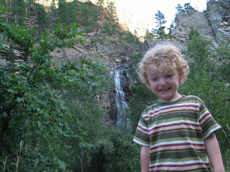 William at Bridal Veil Falls
Bridal Veil Falls is right off of the main drag through Spearfish Canyon, so we woke the boys up so they'd at least see something...  William is never too pleased to be woken up, but he fakes a smile here...
