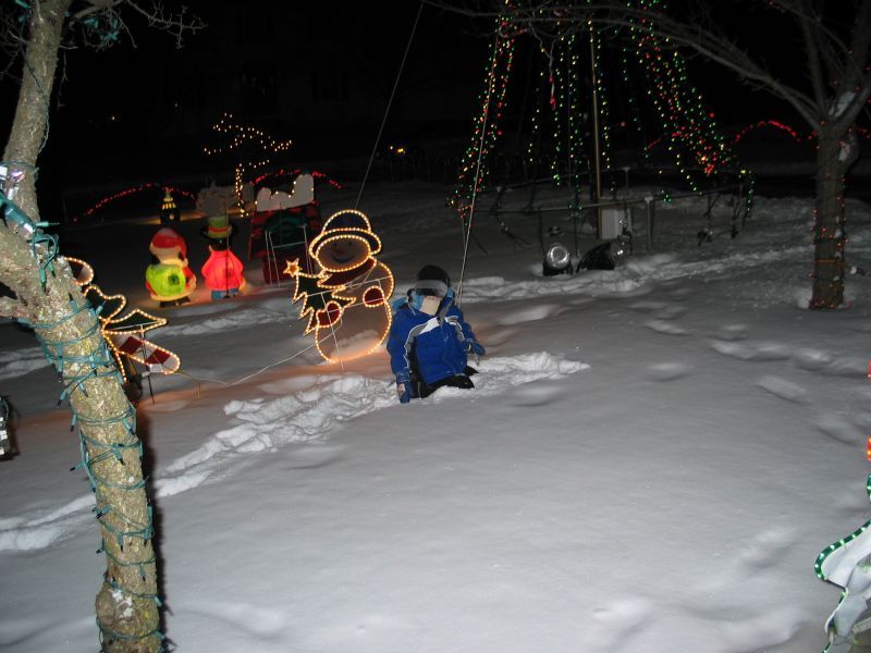Snow!
William had fun in the snow, while enjoying the lights.
