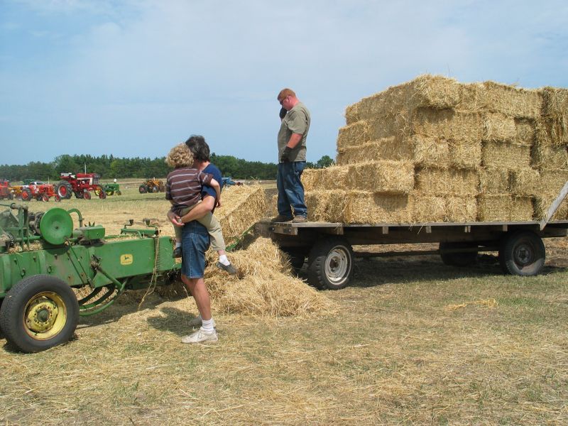 Baling Display
Dad attempts to explain to William how the baler works.  Too bad Grandpa Fischer isn't around to do a much better job of it...
