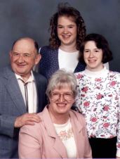 Cathy's Family
This is a picture of Cathy's family, taken in the early 90's. Shown here are Cathy, her sister Jen, her mom Patricia (who passed away in 1994), and her dad Vernon.
