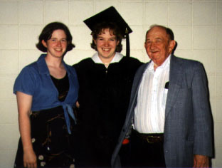 College Graduation
Cathy with sister Jen and her Dad on the occasion of her college graduation in 1997.

