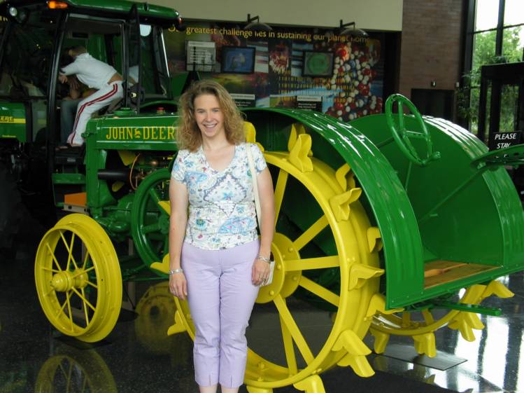 Cathy and Deere
Cathy poses by a very nicely restored old Deere.
