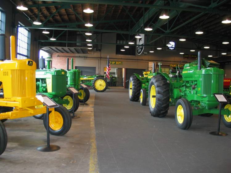 Inside the Deere Collectors Center
Inside the collectors center.  We spent quite a bit of time here.  Each tractor is on loan from the owner, and they get new exhibits rotating through periodically. 

