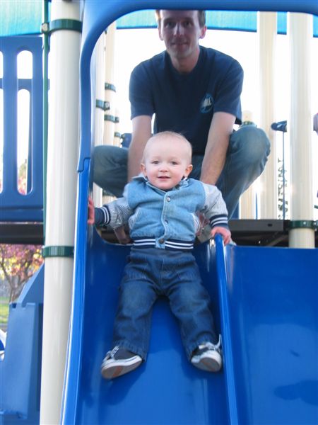 Weeeee!
William loves slides.  Here Daddy helps him down one.
