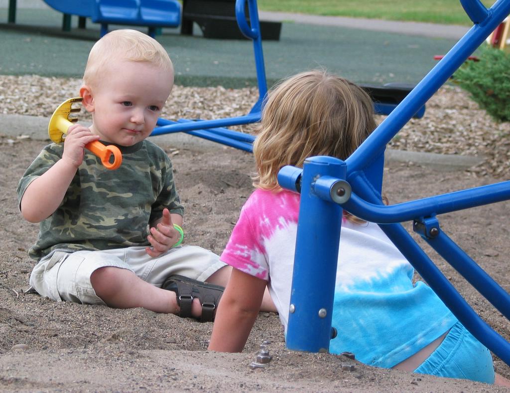 Flirt
William flirts with a girl in the sandbox.  I think in the end she got annoyed, as he kept filling in the hole she was trying to dig.
