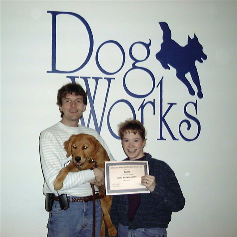 Puppy Kindergarten Graduation
On March 30, 2002, Bailey received his first diploma by graduating from Puppy Kindergarten.  Above proud parents Tim & Cathy show off the diploma (although Bailey seems more interested in looking for a treat).
